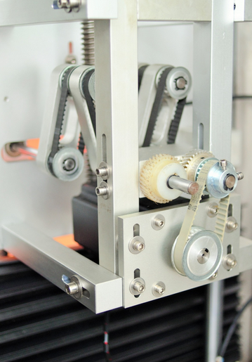 Малгай ба их бие битүүмжлэх нь хоёр толгойтой, багасдаг ханцуйны шошгоны машин юм