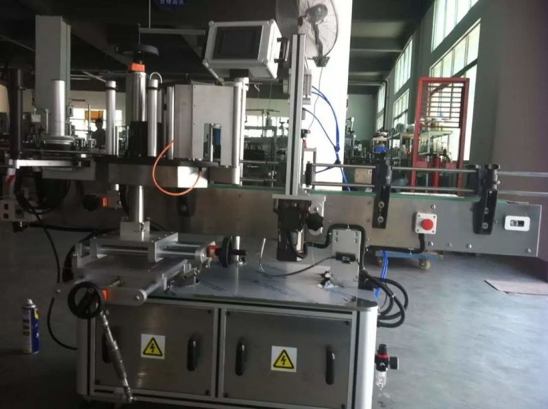 Хятад улсын Жимс / Хүнсний ногооны жүүс, ундааны үйлдвэрт зориулагдсан дугуй шилэн наалт шошголох машин